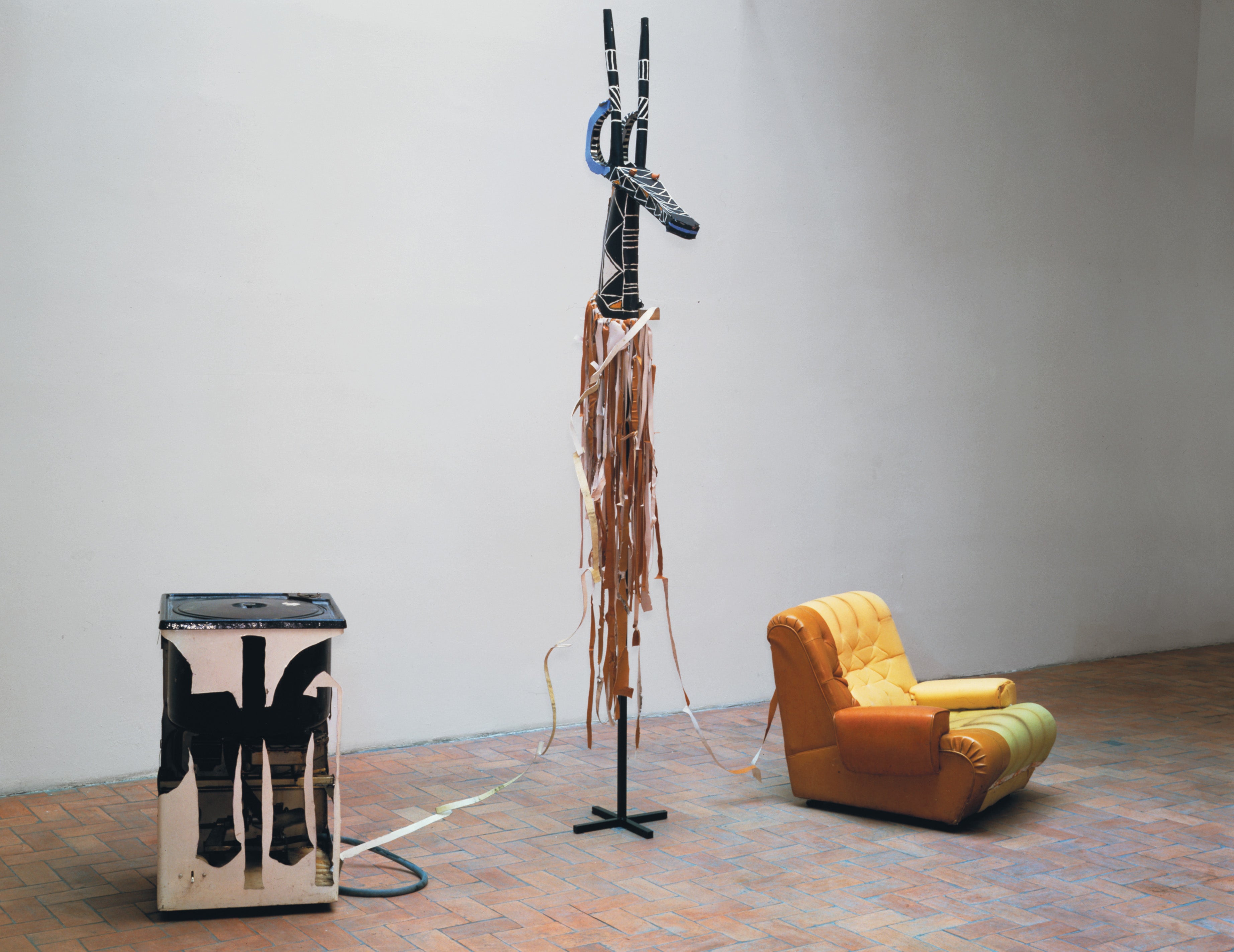 Armchair, Washing Machine and Kurumba  Mask